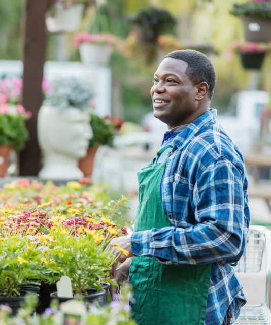 a man working with flowers